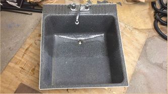 Plastic Sink Sealed with Grolar Sealants